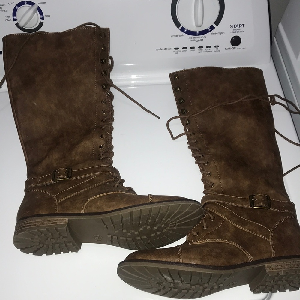 Below the knee brown/tan lace up combat boots